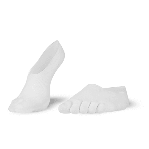 A photo of Knitido low cut toe socks made with cotton, nylon, polyester, and elastane. The socks are a white color. Both socks are shown beside each other angled slightly to the left, the right sock has its heel lifted off the ground against a white background. #color_white