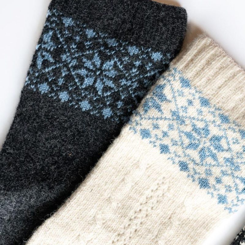 knitido merino cashmere snowflake socks beige blue anthracite light blue white background diagonal cuff