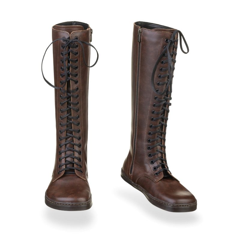 A photo of Brandy Peerko Empire boots made from leather and rubber soles. The boots are a tall riding boot style with laces all the way up and a side zipper. Both boots are shown beside each other from the front, the left boot is slightly angled to the right against a white background. #color_brandy