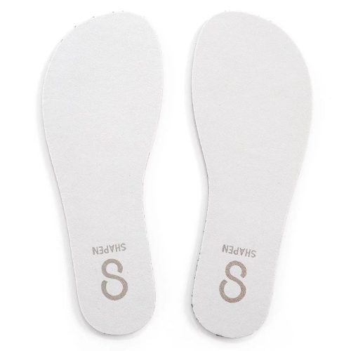 White leather Shapen insoles shown from above against a white background.