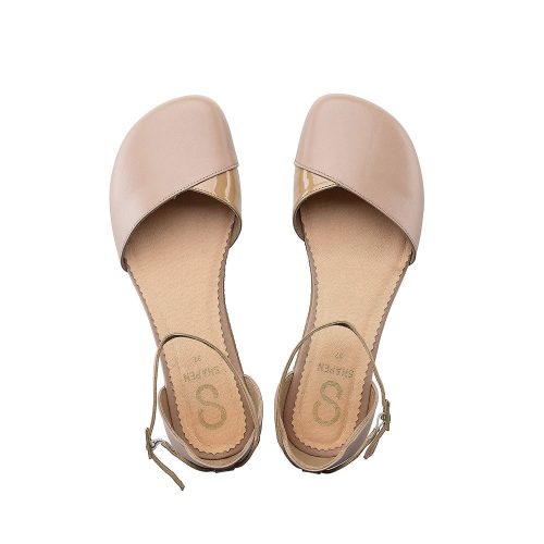 A photo of Beige Shapen Poppy D’orsay dressy flats with a leather upper and rubber soles. The flats have a heel cup and dainty ankle straps, the inside of the sole are a beige color. Both shoes are shown from above against a white background. #color_beige